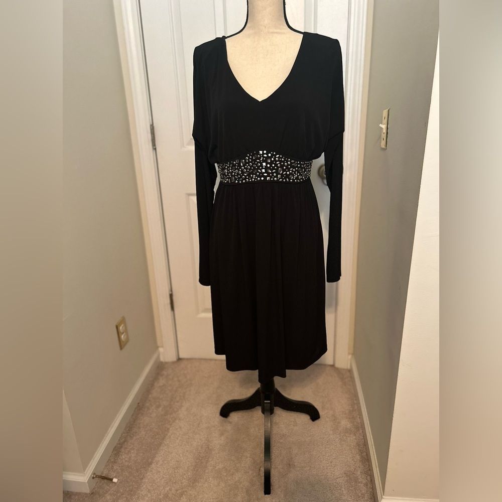 Black dress, NWOT, v neck, gun metal studs in the front,